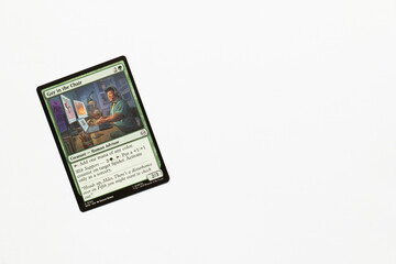 Naklejka premium Bradford, UK Nov 3 2025 Guy in the Chair card from Spider-man magic the gathering card game shot isolated on a white paper background.