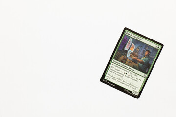 Naklejka premium Bradford, UK Nov 3 2025 Guy in the Chair card from Spider-man magic the gathering card game shot isolated on a white paper background.