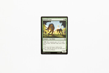 Naklejka premium Bradford, UK Nov 3 2025 Kraven's Cats card from Spider-man magic the gathering card game shot isolated on a white paper background.