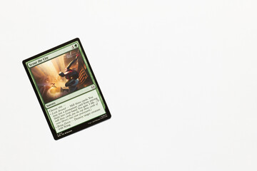 Naklejka premium Bradford, UK Nov 3 2025 Scout the City card from Spider-man magic the gathering card game shot isolated on a white paper background.