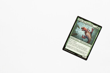 Naklejka premium Bradford, UK Nov 3 2025 Spider-Rex, Daring Dino card from Spider-man magic the gathering shot isolated on a white paper background.