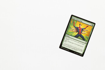 Naklejka premium Bradford, UK Nov 3 2025 Grow Extra Arms card from Spider-man magic the gathering shot isolated on a white paper background.
