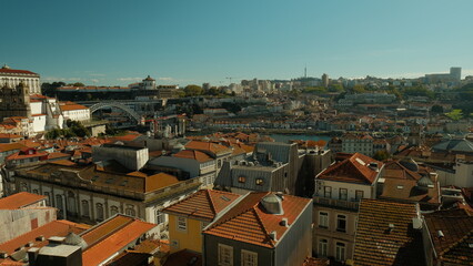 Panoramic view of Porto city with red rooftops and Dom Luis I Bridge, Portugal