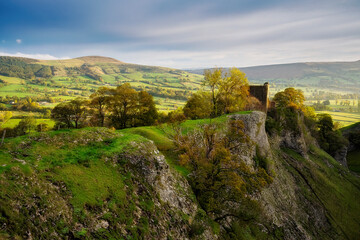 Peveril Castle in the sunlight ,view of the mountains in the morning