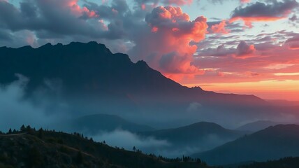 Majestic mountain landscape at sunset with colorful clouds, soft mist over rolling hills, dramatic sky and serene atmospheric scenery. Generative AI.