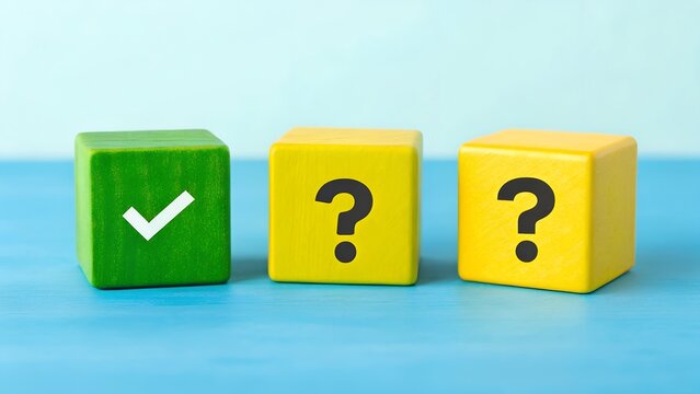 Check mark and question mark blocks – concept of decision-making, problem-solving, correctness, uncertainty, and evaluation