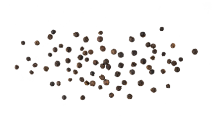 Dried black pepper berries closeup flying isolated on white background. Aromatic spicy ingredient for cuisine.