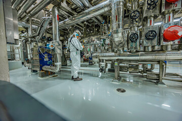 Male work inspection process stainless steel pipe stainless with pressure meter in equipment tank...