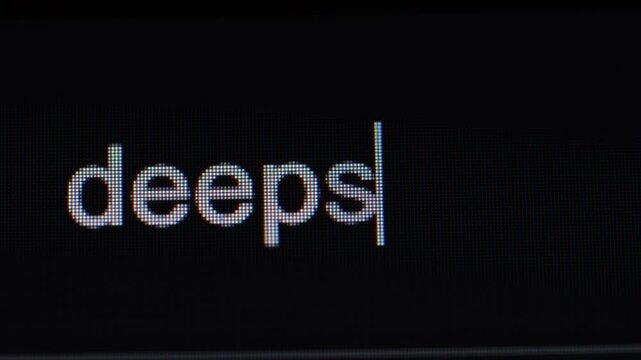 A close-up view of the company name "deepseek" being typed into a search bar