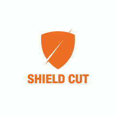 Orange shield illustration, with diagonal lines and bold  "SHIELD CUT" below on a white backdrop
