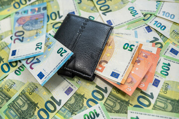 Euro cash and wallet symbol of wealth and economic balance