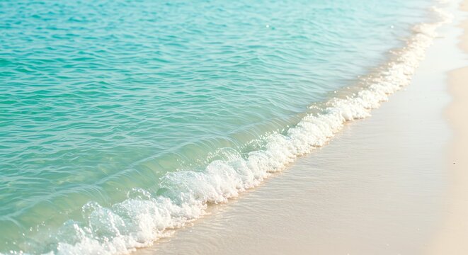 Turquoise water meets white sand beach