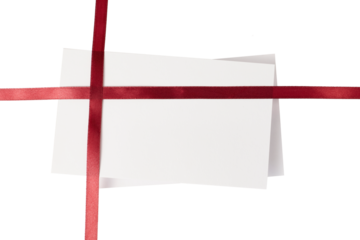 blank white christmas gift card with red gift ribbon isolated on white or transparent png