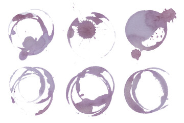 Real red wine stains and glass ring marks on white background. Vine glass round stains set. Artistic grape juice spill texture for food and drink design