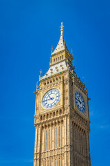 Obraz premium Close-up of Big Ben clock face under bright sunlight in London on a sunny day