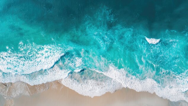 Aerial view of turquoise ocean waves gently crashing on soft sandy beach, capturing vivid sea colors and relaxing tropical vibes, ideal for travel ads, nature banners, and summer backgrounds