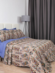 sofa cushions and bedspreads made of tapestry on a sofa or armchair, variegated fabric