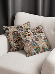 sofa cushions and bedspreads made of tapestry on a sofa or armchair, variegated fabric