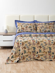 sofa cushions and bedspreads made of tapestry on a sofa or armchair, variegated fabric