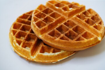 Homemade Belgian waffles isolated, selective focus