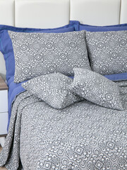 sofa cushions and bedspreads made of tapestry on a sofa or armchair, variegated fabric