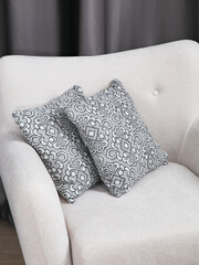 sofa cushions and bedspreads made of tapestry on a sofa or armchair, variegated fabric