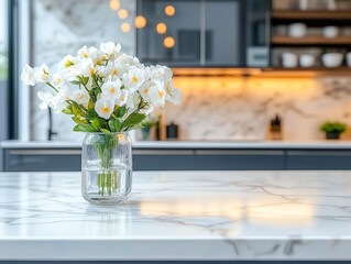 A stylish kitchen countertop featuring a vase with peonies and greenery.