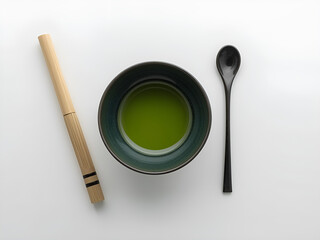 Traditional Japanese matcha tea ceremony set with bamboo whisk, spoon, and bowl