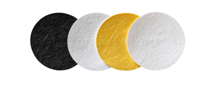 Three circular, textured discs in black, white, and gold