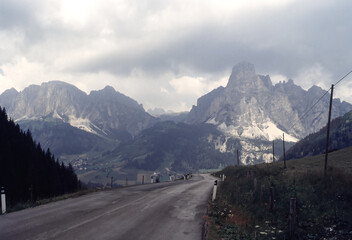 Mountain landscape along the road to Campolongo Pass, Dolomites, Italy
