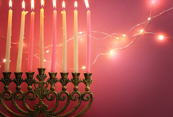 Religion image of jewish holiday Hanukkah background with menorah (traditional candelabra) and...