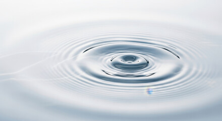 Ripple Effect in Water Circular Disturbance on Surface of Clear Liquid Minimalist Serene Aquatic Tranquility Simplicity Motion Abstract Background