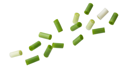 Fresh cut green onion pieces flying in the air, isolated on transparent background