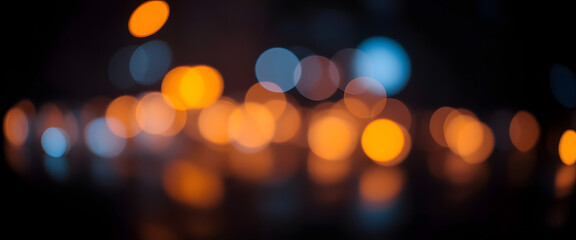 Colorful bokeh lights create a bright, defocused abstract background of Christmas night celebrations