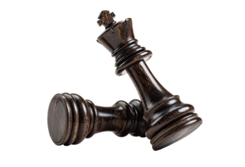 Two dark wooden chess pieces, king and another, in mid-conflict, angled slightly upwards