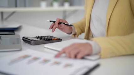 Adult hands using smartphone for secure online payment holding gold credit card shopping from home office desk digital transaction modern technology - Powered by Adobe