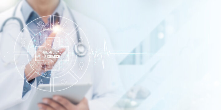 Biomedical Research concept in advanced healthcare — doctor using digital tablet and virtual scientific interface to represent biotechnology innovation, laboratory analysis, and medical technology