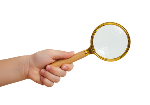 A human hand carefully presents a classic golden magnifying glass against a striking black backdrop emphasizing close inspection