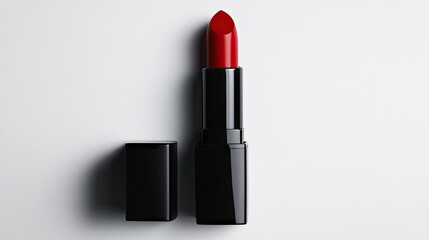 Matte red lipstick in sleek black case isolated on white background, perfect for beauty product advertisement