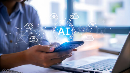 A person using a smartphone with ai icons floating above it, with a laptop in the background, showcasing technology integration
