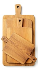 Fototapeta premium Assortment of four wooden cutting boards stacked and angled on a white background