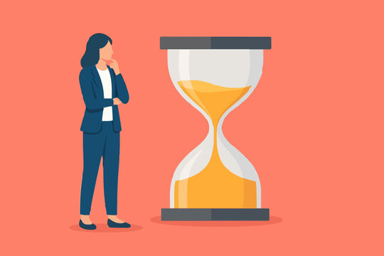 Business time - Bearded businessman standing and looking at hourglass while time goes by. Patience, delay and tolerant concept