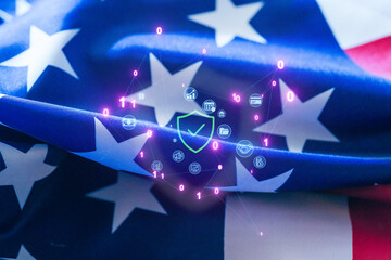 Digital security symbols overlaying a waving American flag illustrating the importance of cybersecurity in the United States
