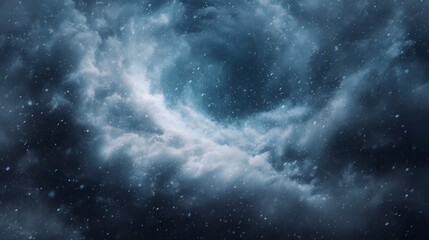 Dramatic swirling storm clouds with falling snow creating a vortex like effect