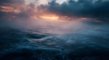 Dramatic seascape at sunrise with stormy clouds and misty turbulent ocean waves