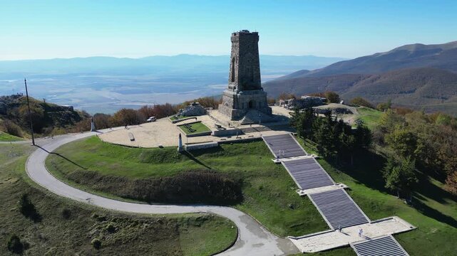 Stunning aerial footage orbiting the Shipka Monument on a sunny autumn day in the Balkan Mountains