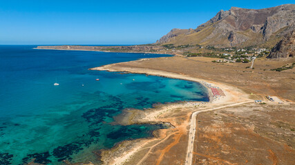 Aerial view of Macari Beach, located near San Vito Lo Capo, in province of Trapani, in Sicily, Italy. It is a beautiful coast with a turquoise and crystalline sea.
