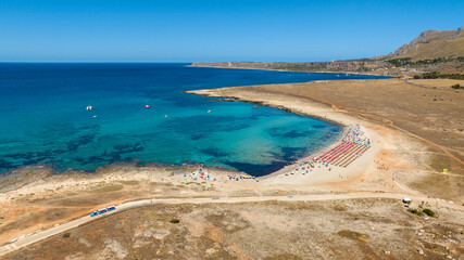 Aerial view of Macari Beach, located near San Vito Lo Capo, in province of Trapani, in Sicily, Italy. It is a beautiful coast with a turquoise and crystalline sea.