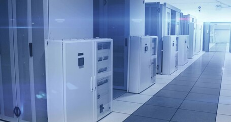 Featuring white server cabinets with breaker panels and black perforated racks in data center hall