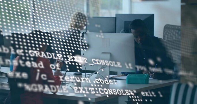 Typing and note taking software team collaborating in open office with code reflections on monitors